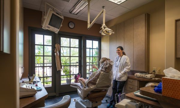 A treatment room at the Scottsdale office with the window open to the courtyard